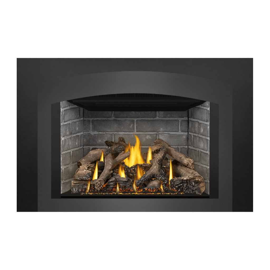 Gas fireplace insert centered view with burning flames, gray brick surround, and logs