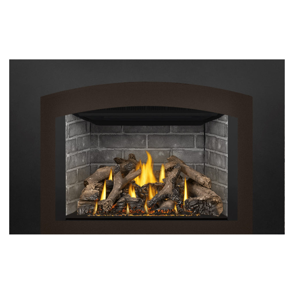 Gas fireplace insert front view with burning flames, gray brick surround, and logs