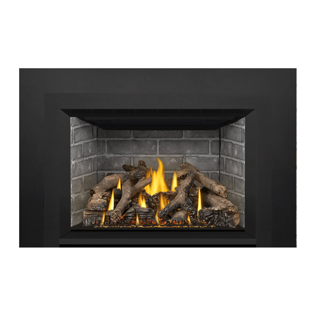 Black direct vent gas fireplace insert with burning flames in a stone-lined firebox