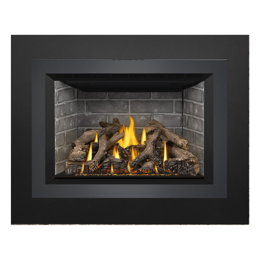 Gas fireplace insert with black frame, brick interior, and burning log set