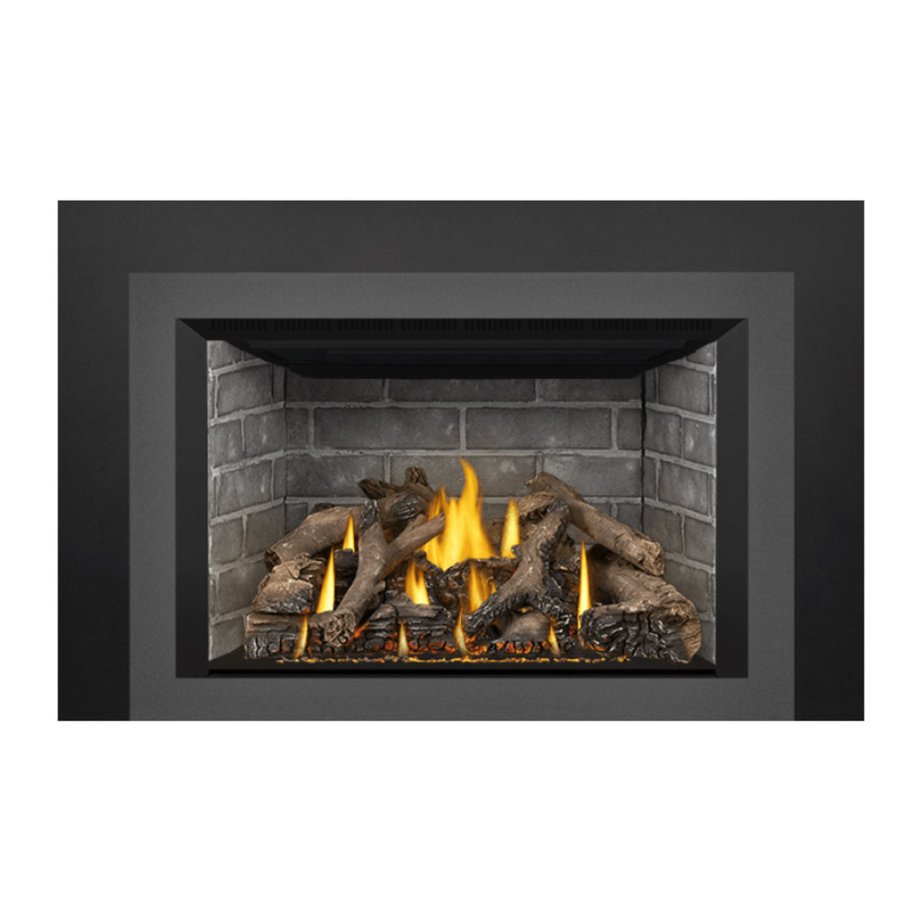 Gas fireplace insert showing brick surround, glowing flames, and dark log set