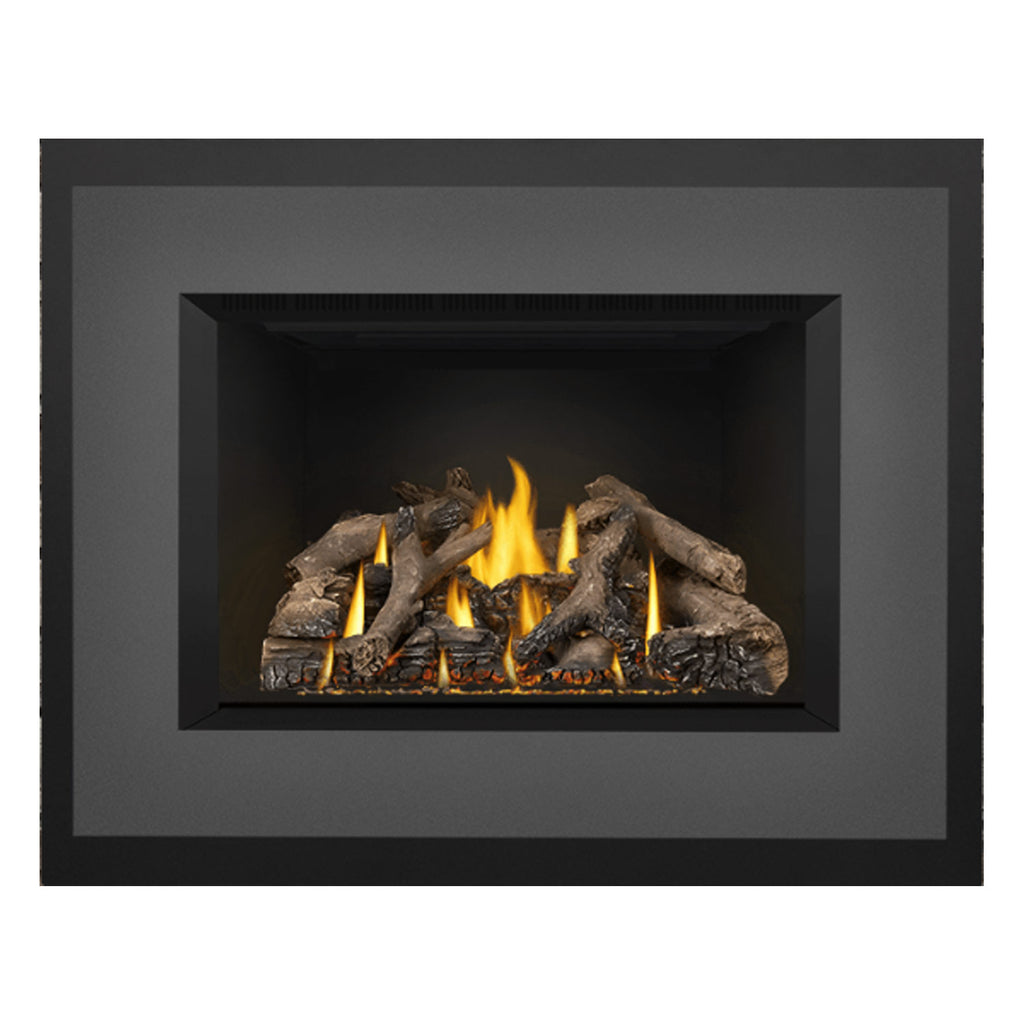 Direct vent gas fireplace insert with glowing logs and flames, dark surround opening
