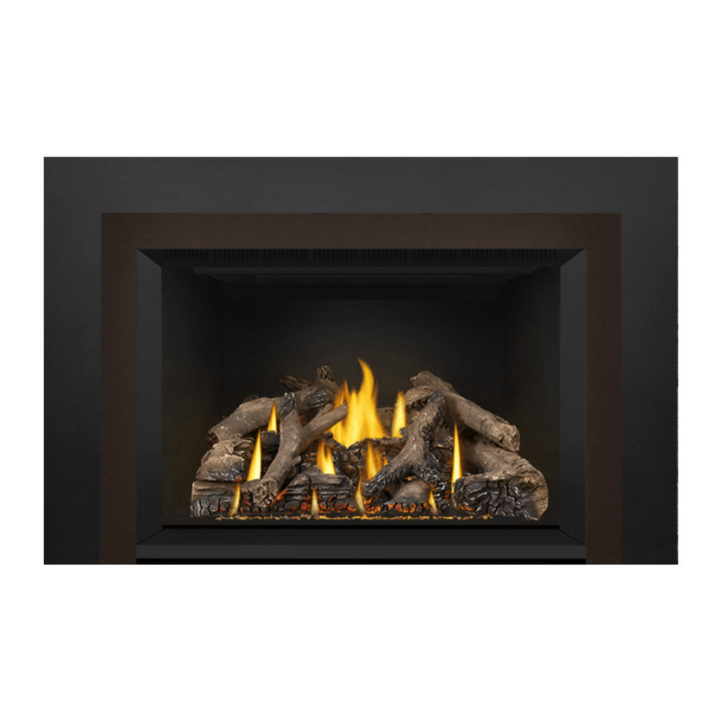 Black direct vent gas fireplace insert with vivid flames and stacked gray logs on the grate.