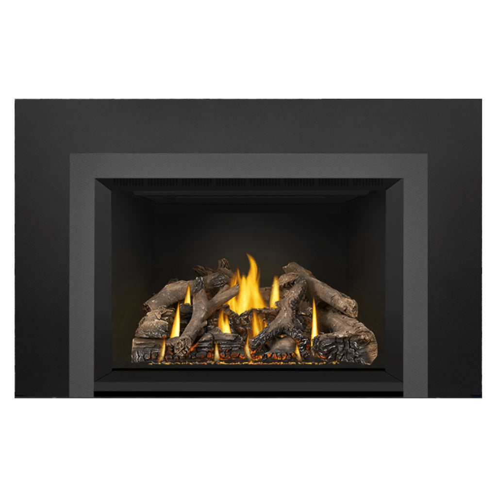 Black direct vent gas fireplace insert with glowing flames and gray log fuel bed.