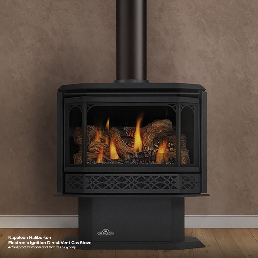 Black direct vent gas stove front with safety screen and burning flames