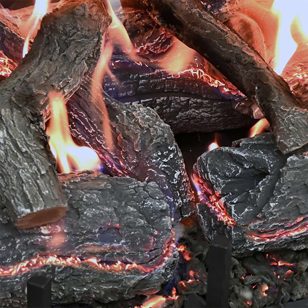 Lava rocks with glowing embers and flames from a gas burner