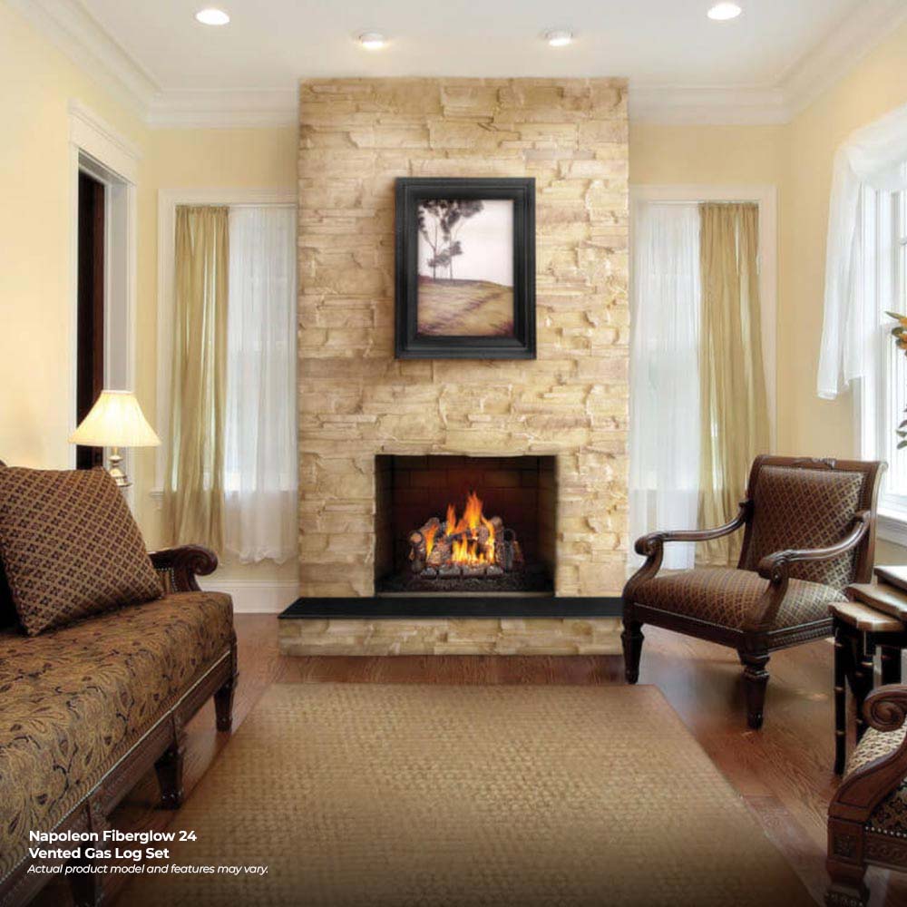 Vented gas fireplace log set with burning logs and bright flames in the hearth