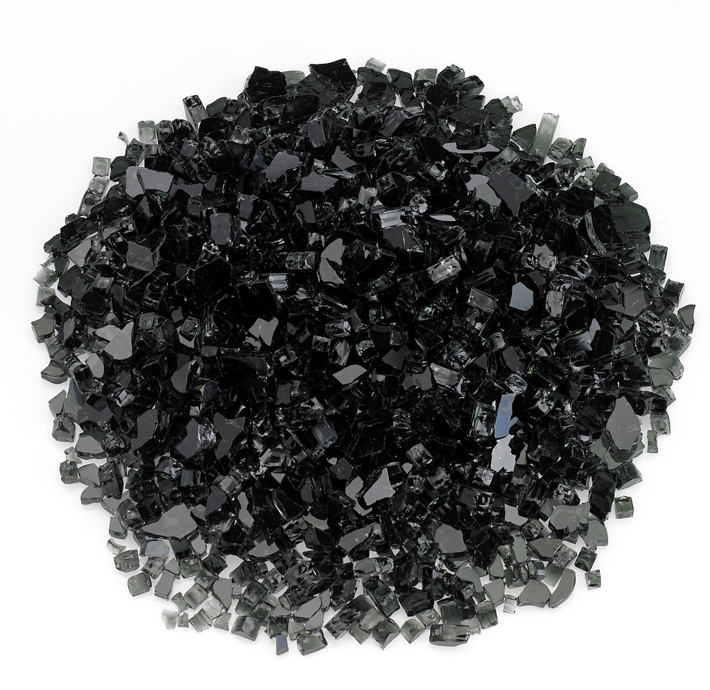 Black fire glass crystals, glossy irregular chunks in a pile