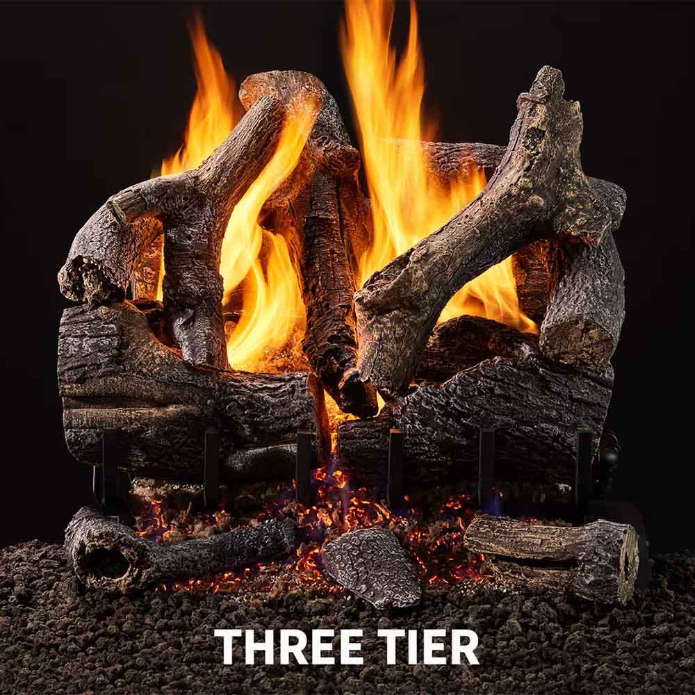 Three-tier vented gas log set with glowing oak-style logs and tall flames
