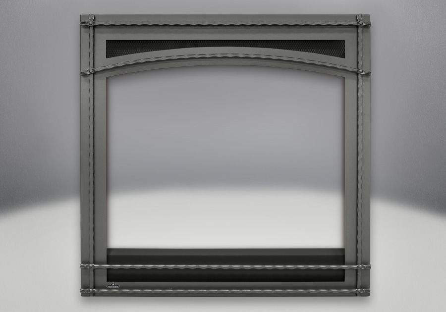 Decorative wrought iron fireplace front with arched top and horizontal bars, dark metal