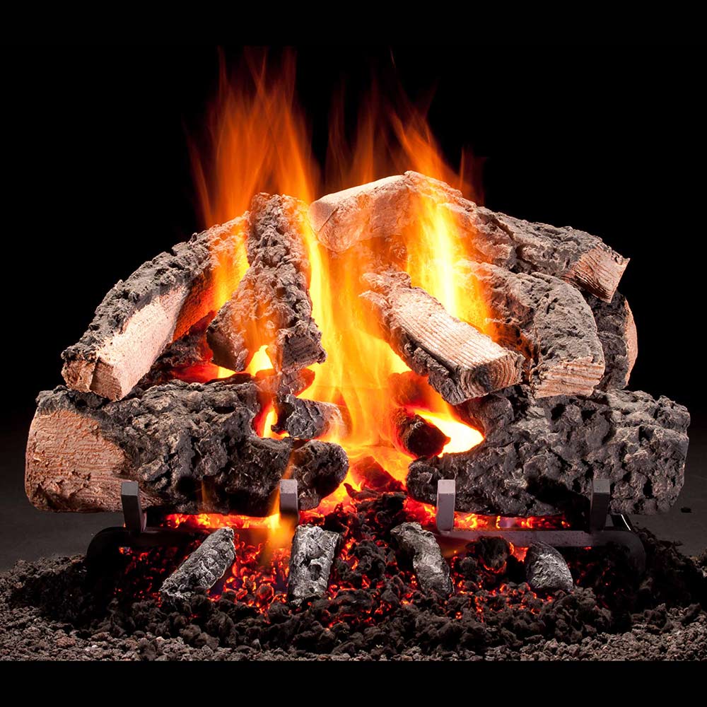 Woodland gas log set with glowing flames and split logs on embers