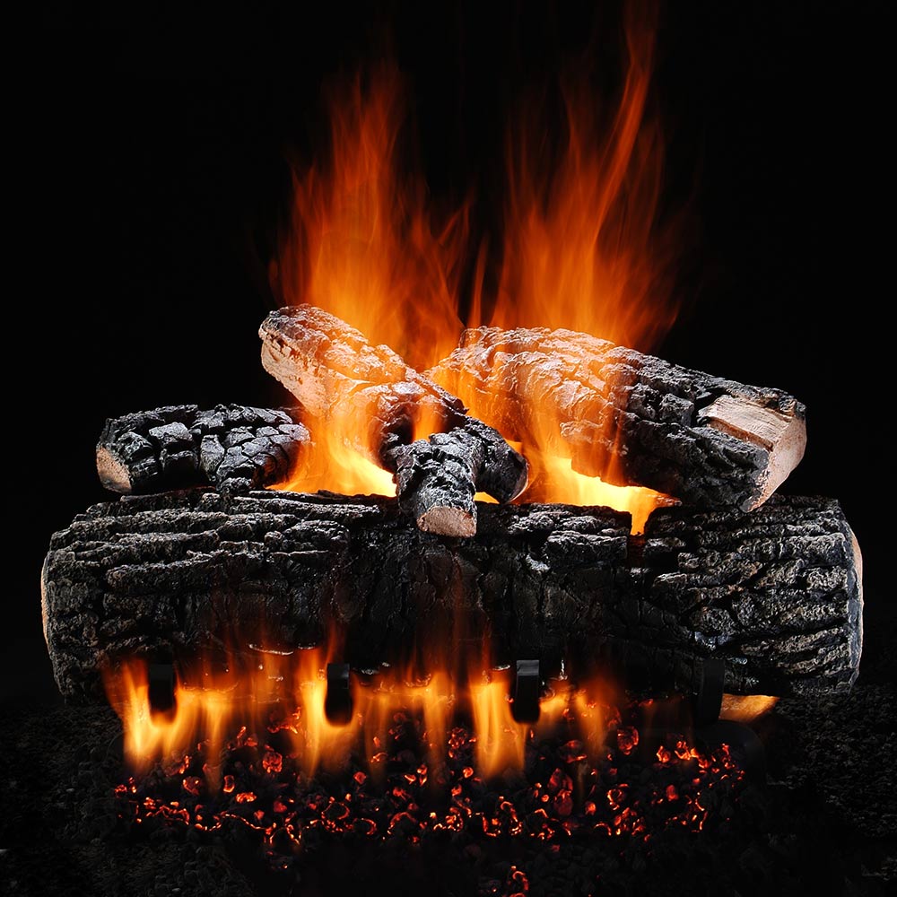 Vented gas log set with glowing orange flames and charred dark logs