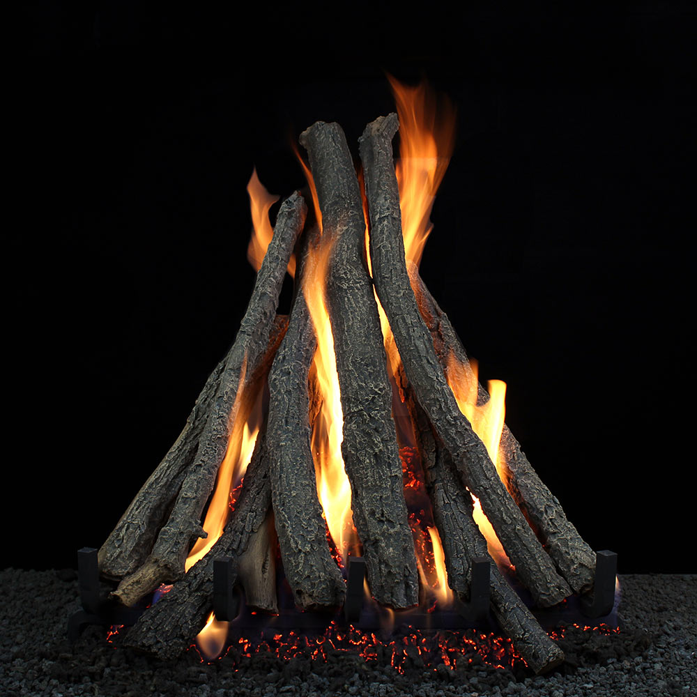Gas log set with vented flames over stacked dark logs