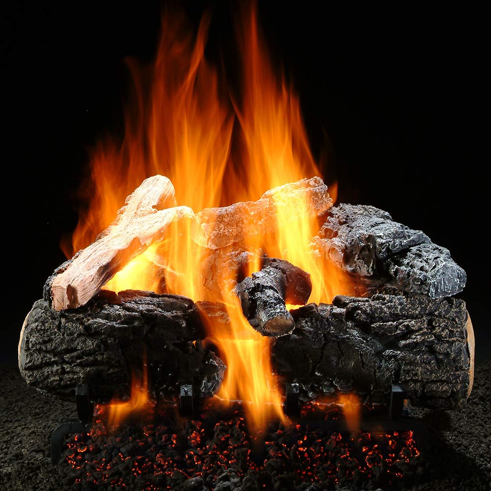 Gas log set with vented burner, showing glowing embers and orange flames over dark logs