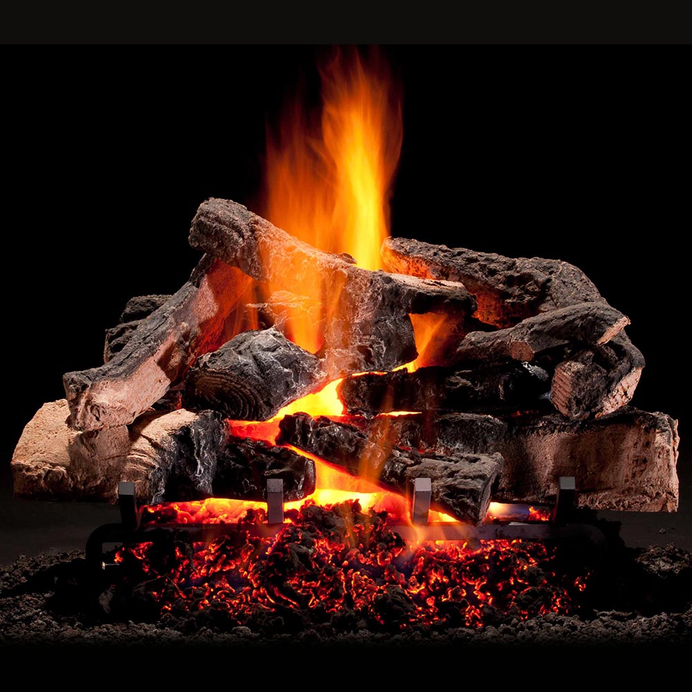 Decorative vented gas logs with burning flames and charred log pieces