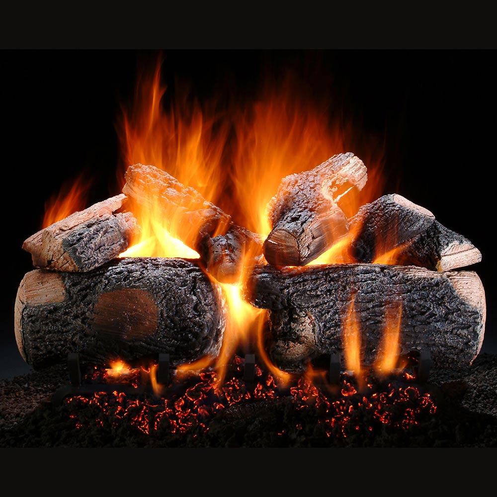 Vented gas log set with split wood rounds and glowing flames