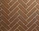 Herringbone brick fireplace firebox liner tiles with white mortar highlights