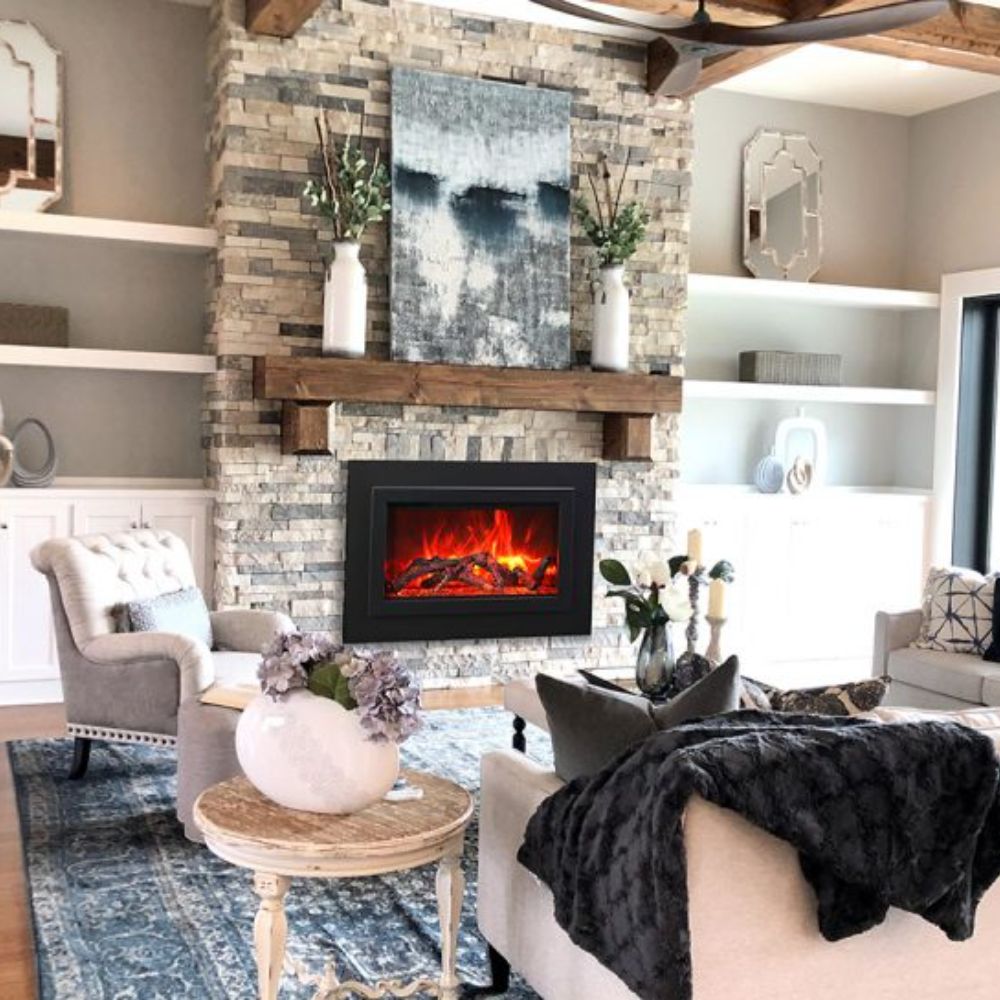 Black electric fireplace insert mounted in living room with red flame glow