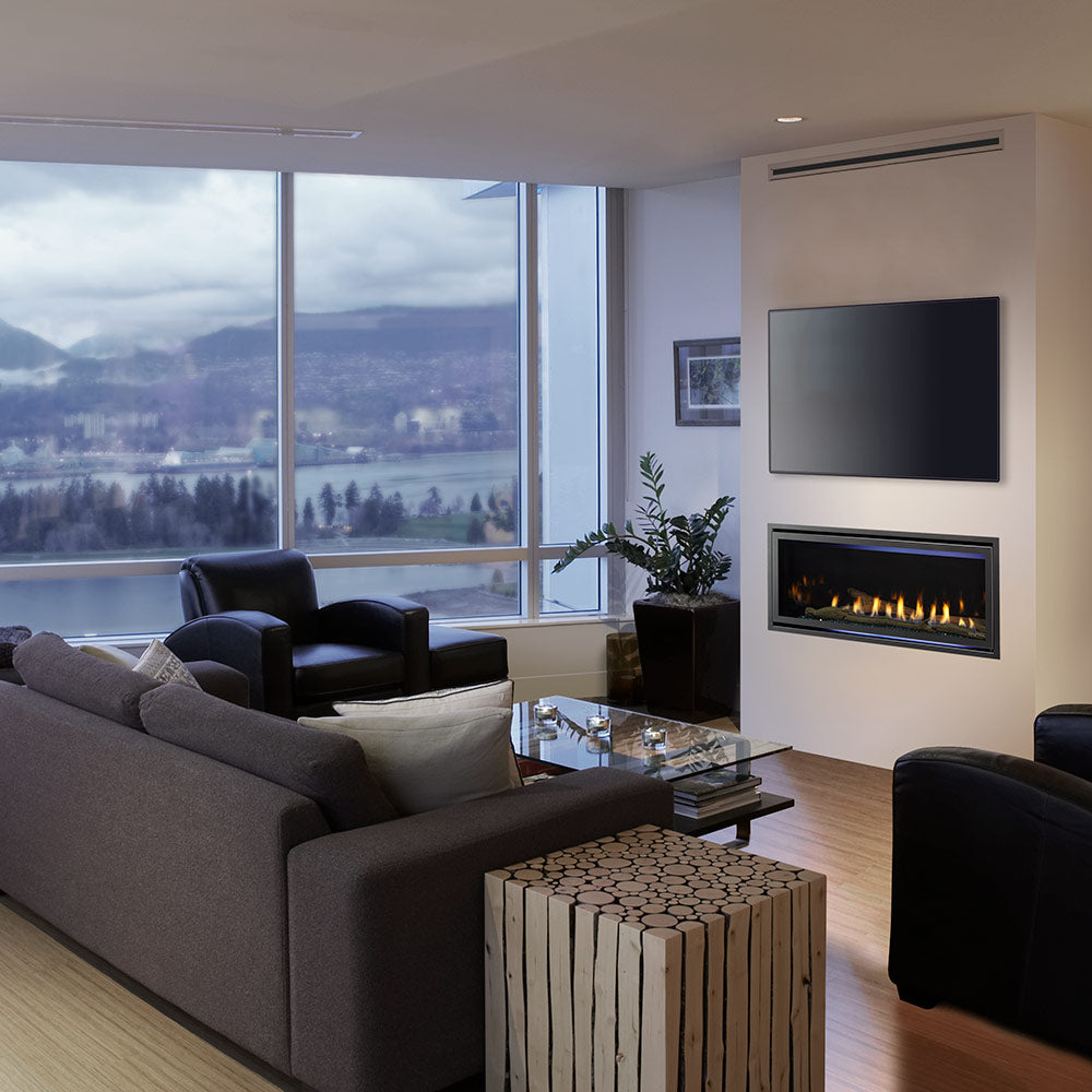 Wall-mounted direct vent gas fireplace with flame display in a modern living room