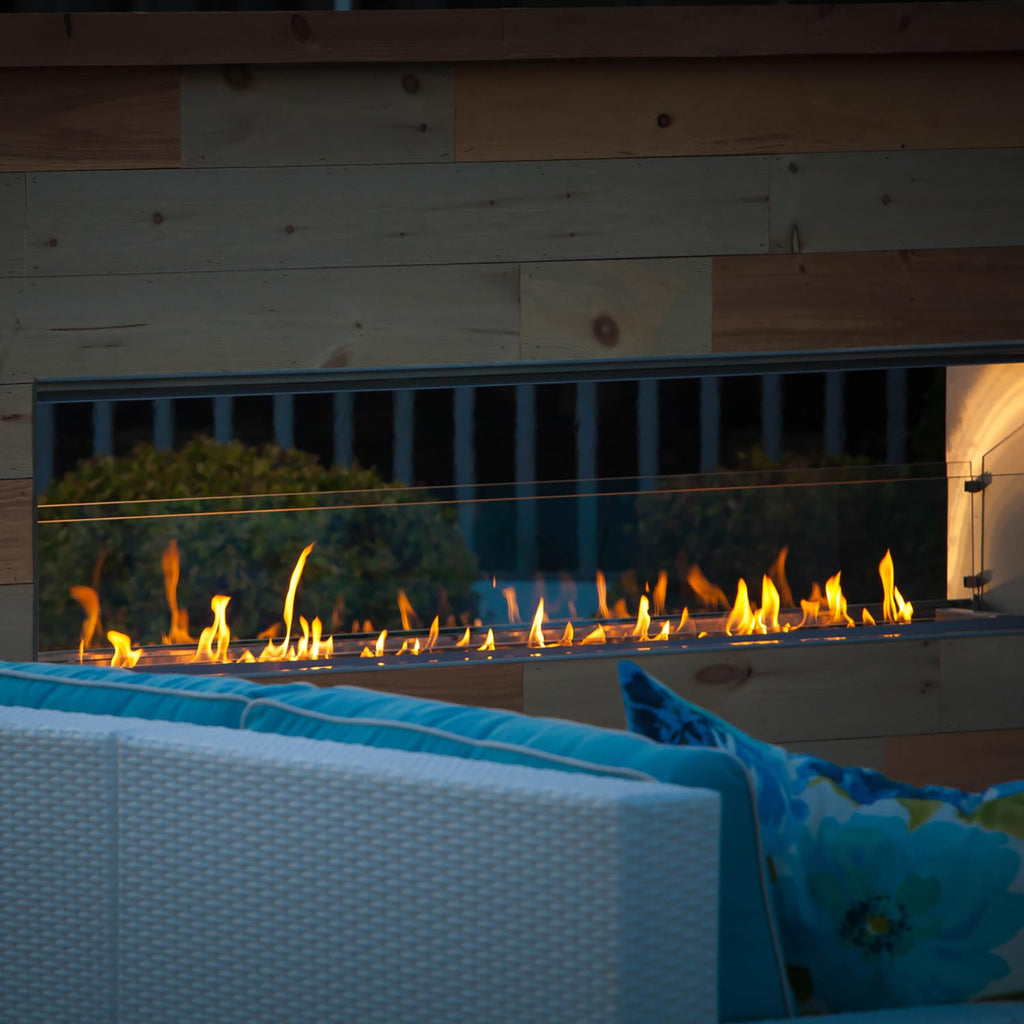 Outdoor fireplace conversion kit insert with visible burner flames