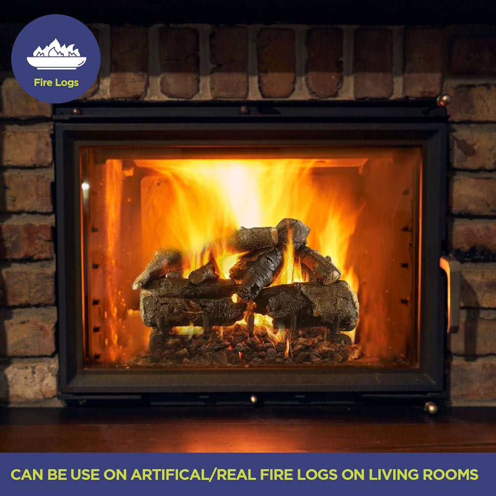 Lava rock bed with glowing flames in a fireplace firebox