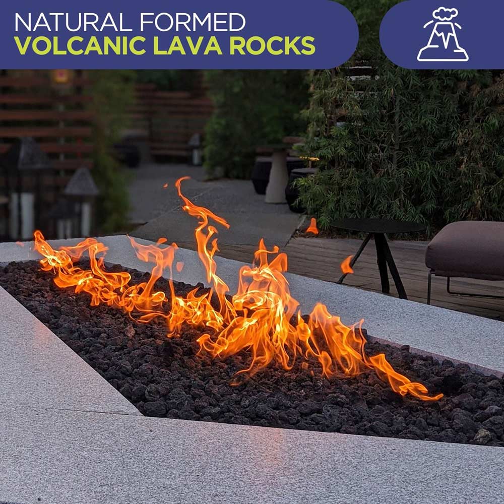 Volcanic lava rocks bed with flames in an outdoor fire pit