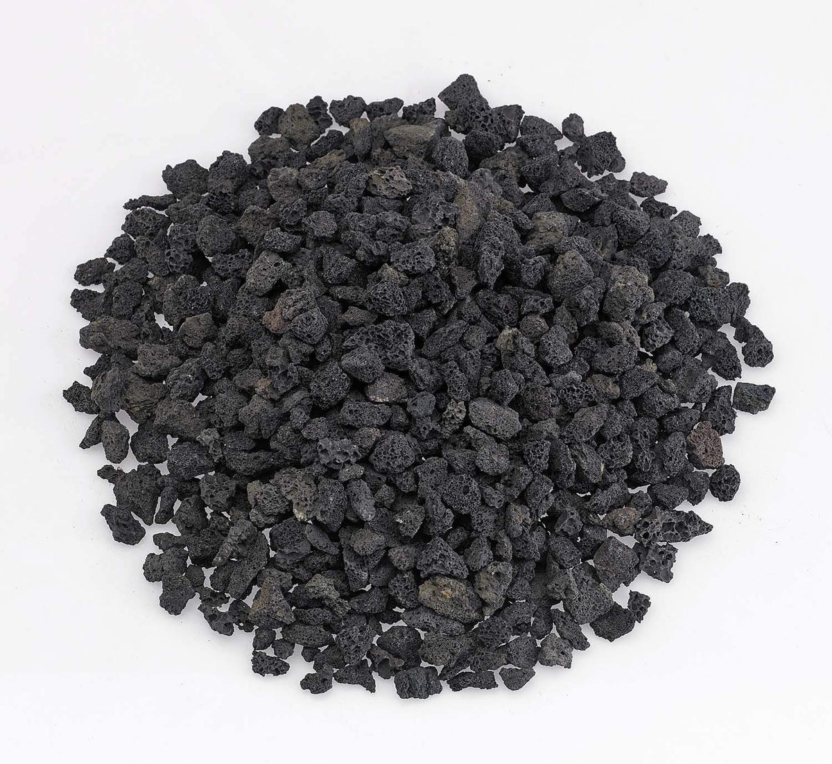 Black lava rock, small crushed pieces in a heap