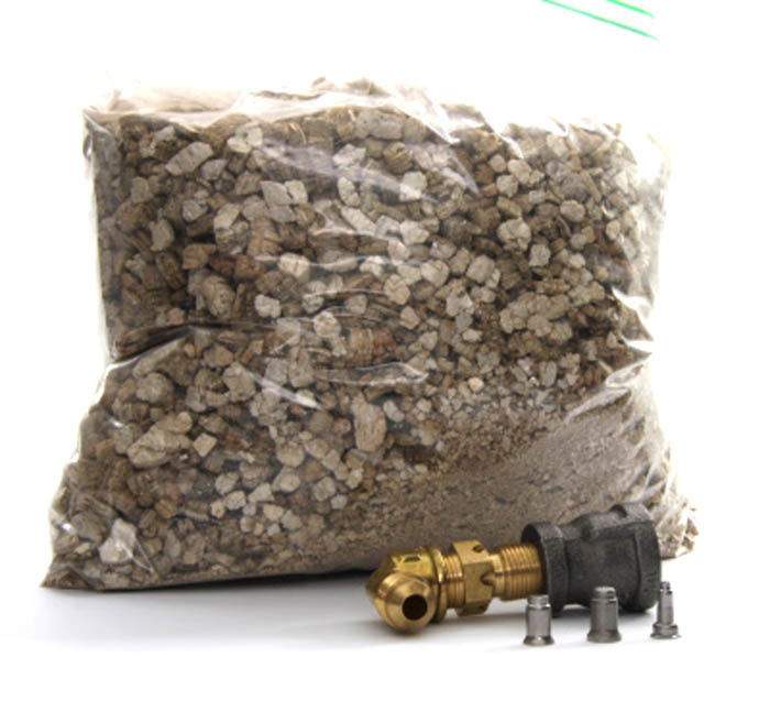 Propane conversion kit with bag of log fuel and brass fittings with small metal parts