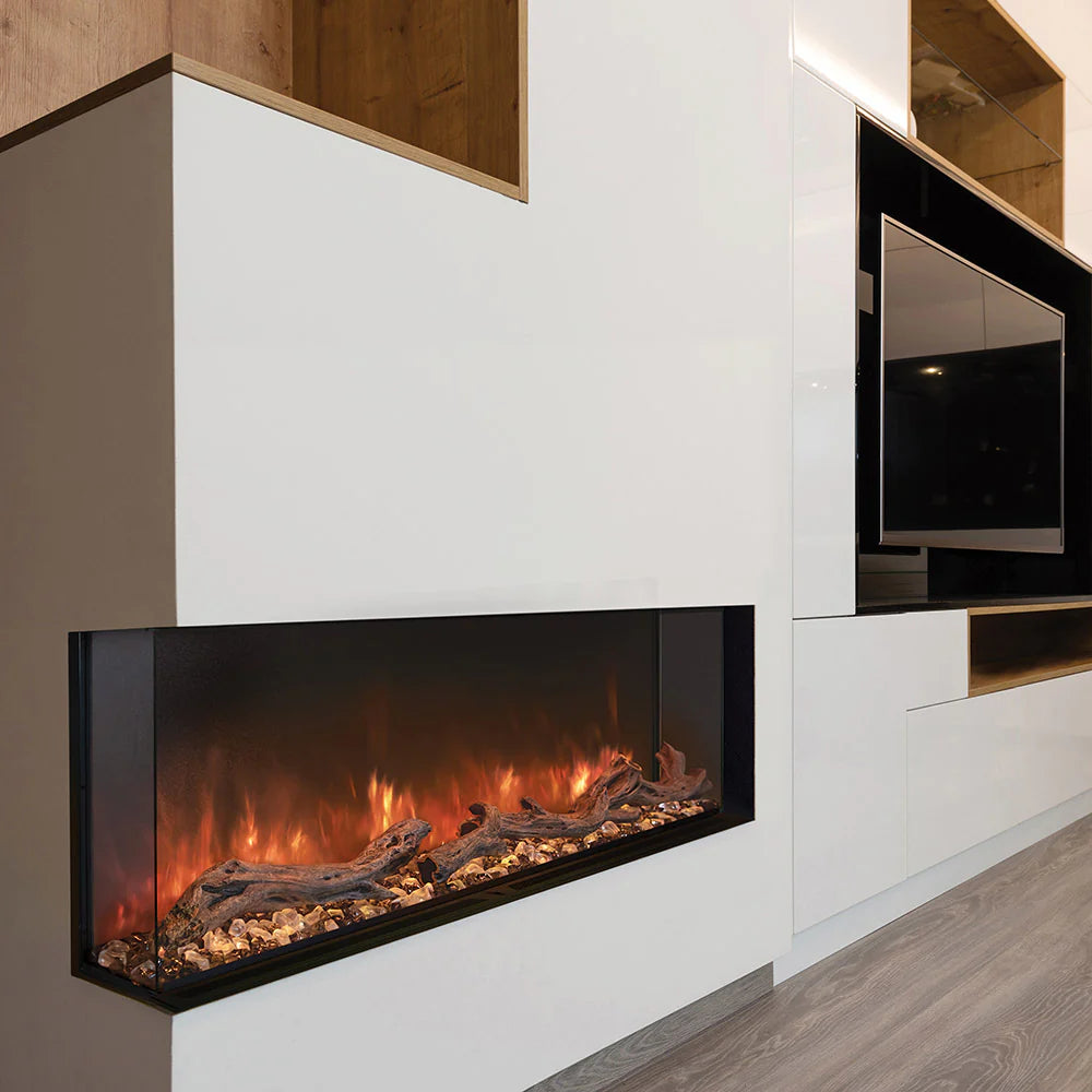 Modern Flames built-in electric fireplace with white surround and three-sided flame display