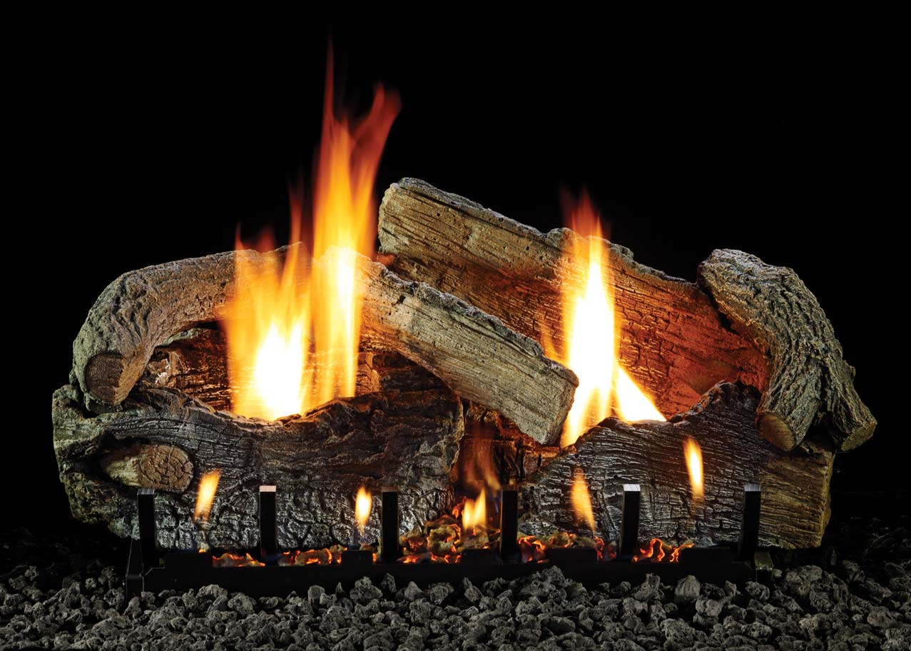 Aged oak refractory fireplace log set with glowing flames and embers
