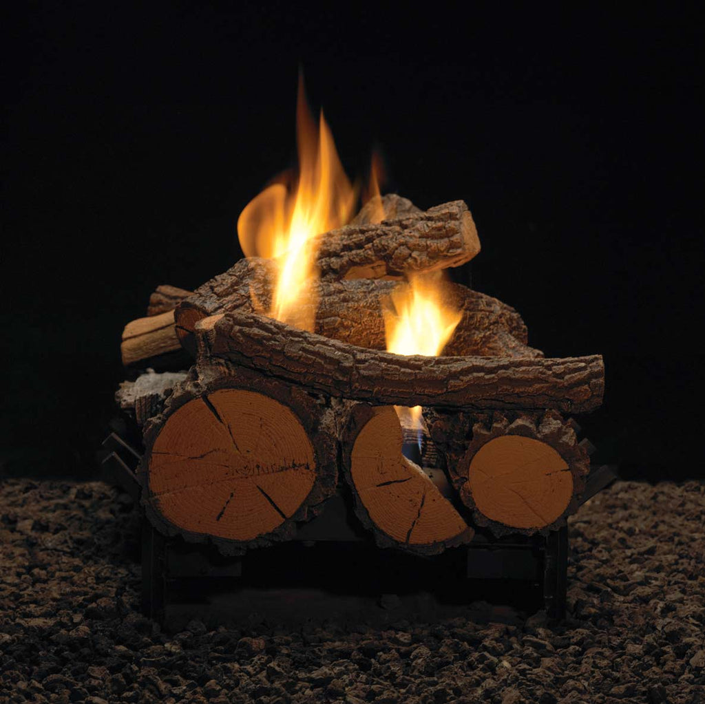 Ventless fireplace interior showing burning logs over an ember bed