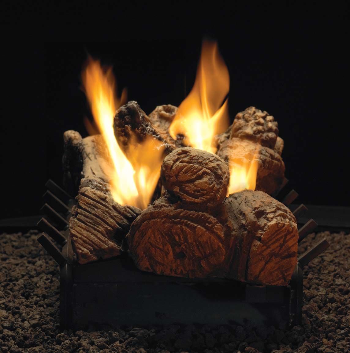 Ceramic fiber fireplace log set with stacked faux wood logs and tall flames