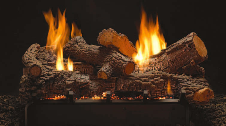 White Mountain Hearth ceramic fiber double-sided gas logs with stone river rocks, burning flames