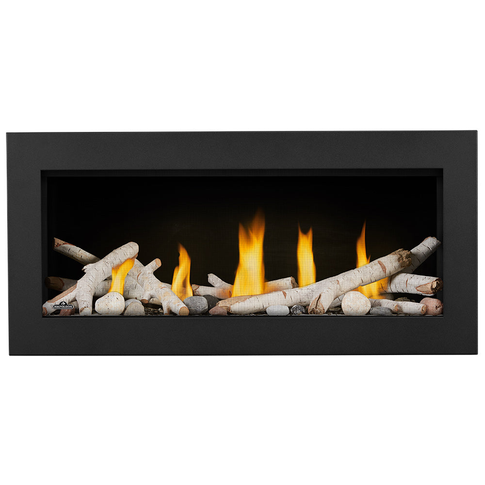 Black gas fireplace with glowing flames and light-colored log pieces in the firebox
