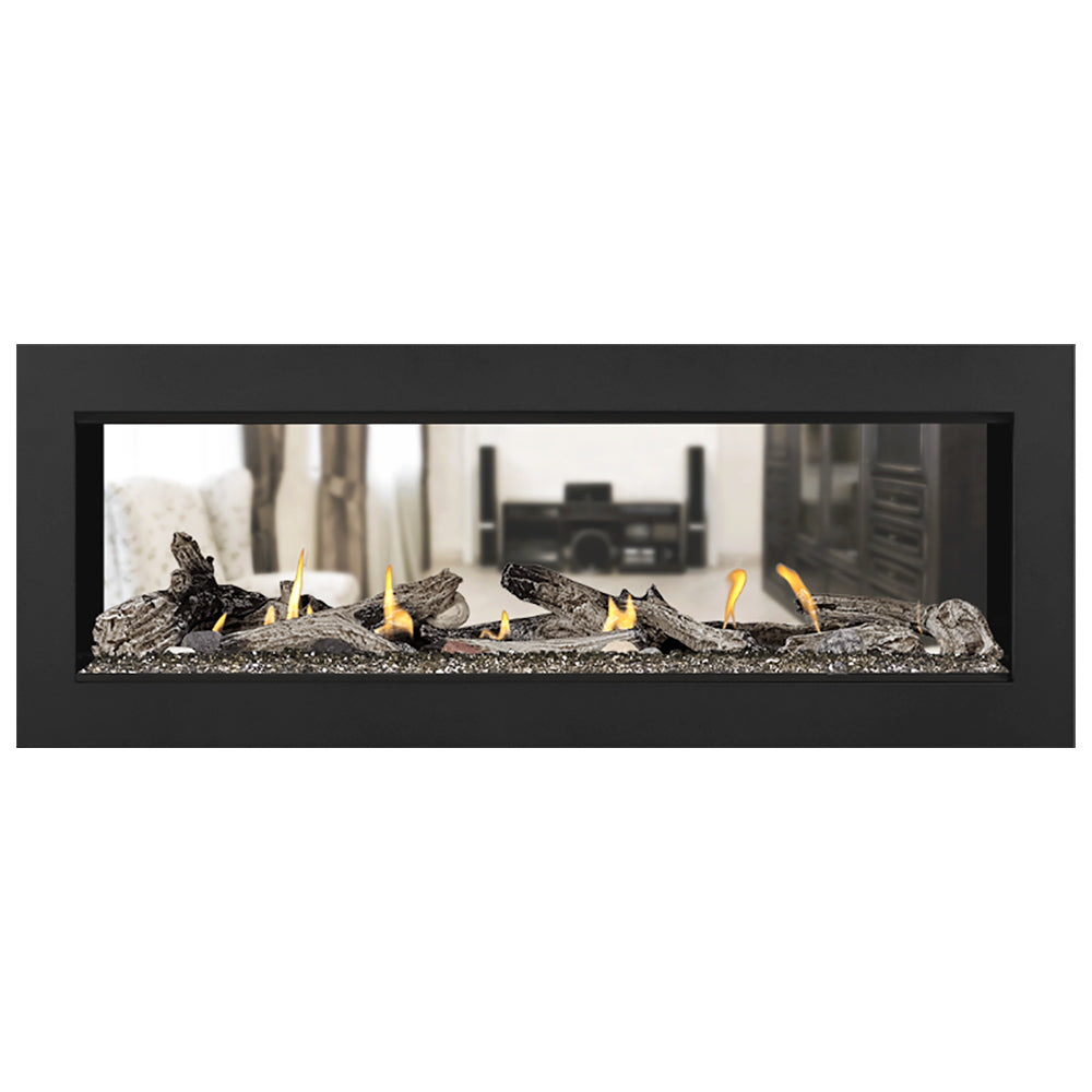 Double-sided gas fireplace with black rock media and visible flames behind the glass