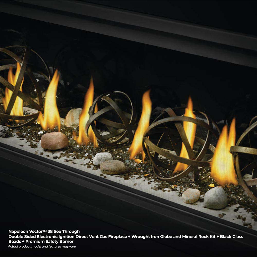 Gas fireplace burner with wrought-iron globe accents and burning flames