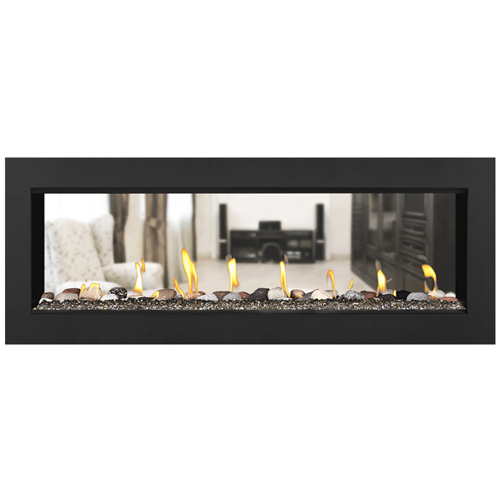 Gas fireplace with burning flames and mixed decorative media in a black firebox