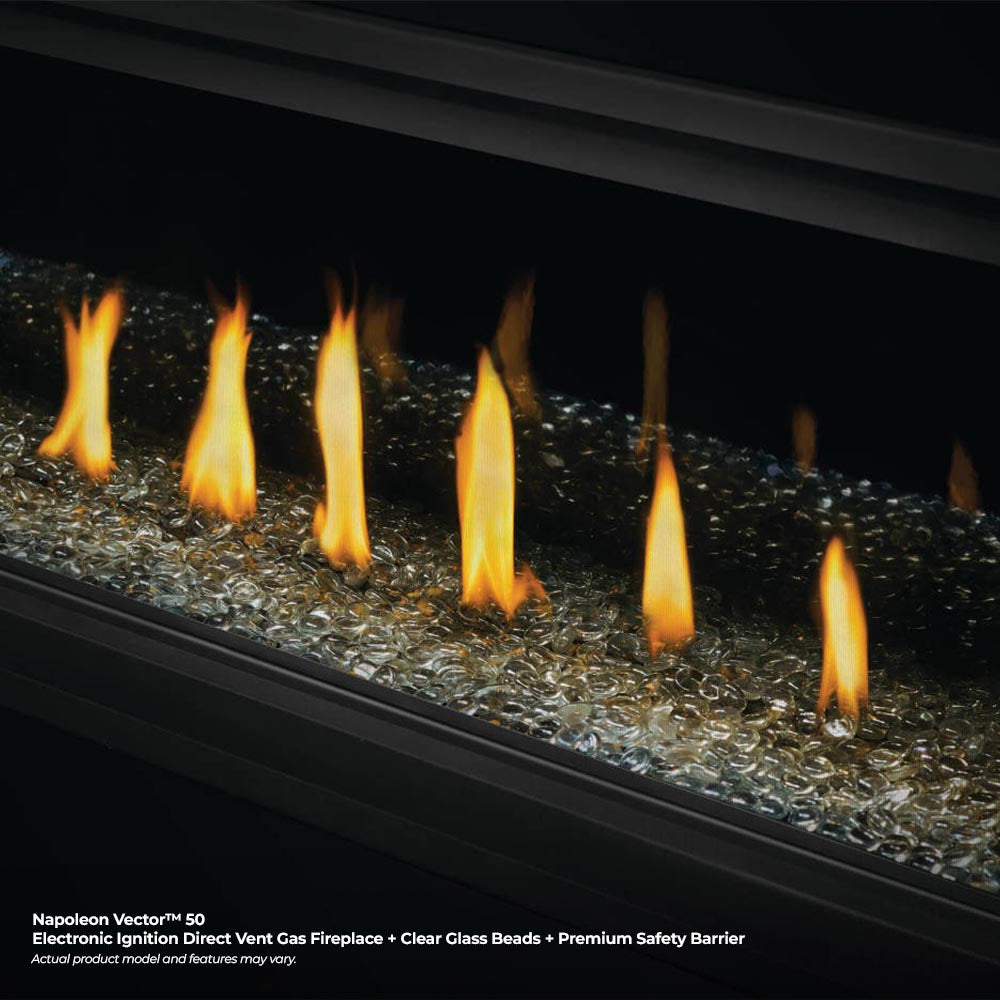 Direct vent fireplace with yellow flames over clear glass beads and dark base