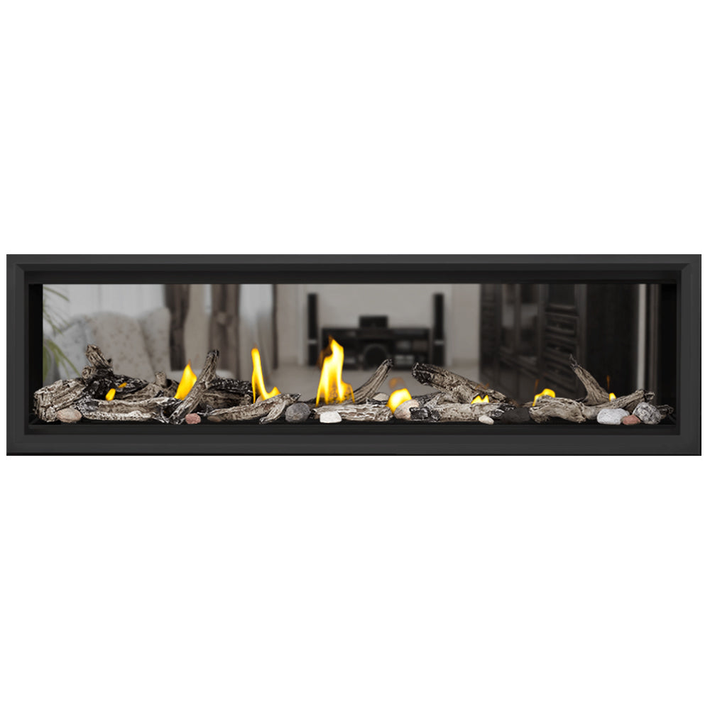 Direct vent gas fireplace with dark rock fire bed and flames