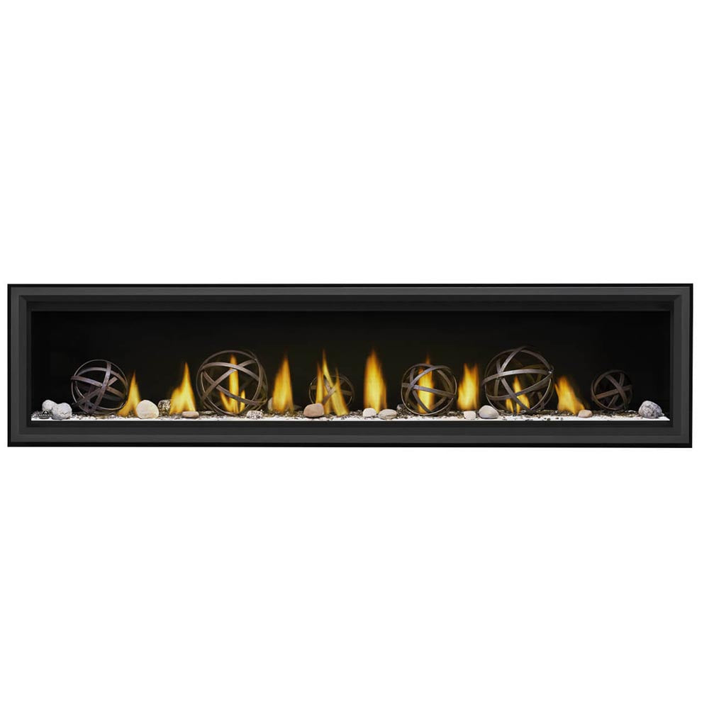 Linear direct vent gas fireplace with flame bed and decorative glass and rock media