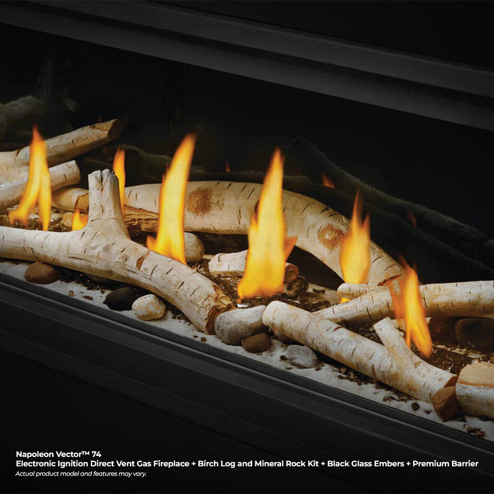 Close-up of linear gas fireplace birch logs with flames and ember bed