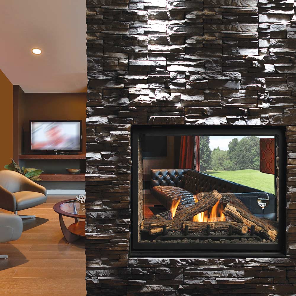 Gas fireplace with black frame and see-through window showing burning logs and orange flames