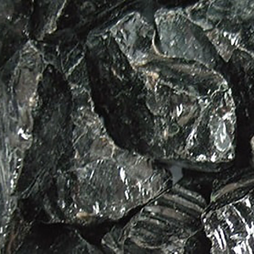 Dark reflective glass media pieces with textured facets
