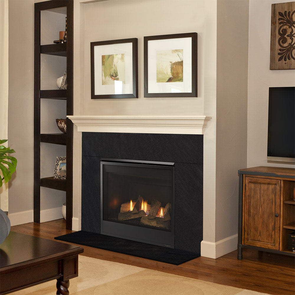 Black gas fireplace insert in white mantel with flames visible in viewing window