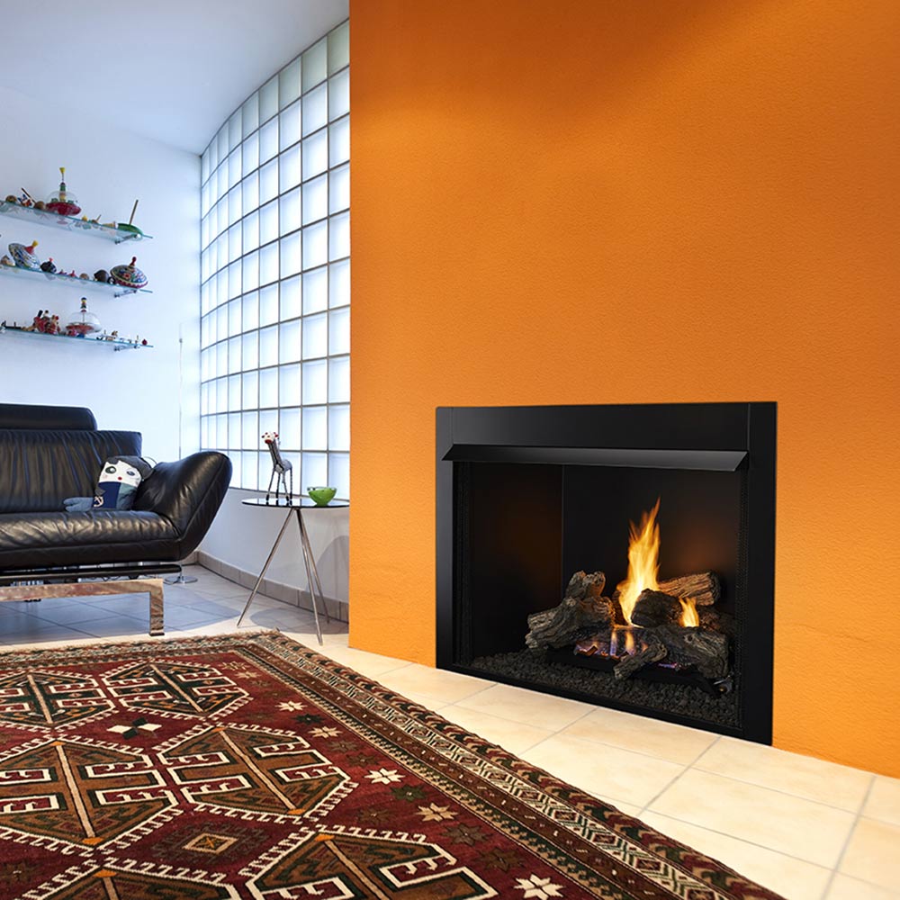 Vent-free gas log set burning inside a black-framed fireplace opening