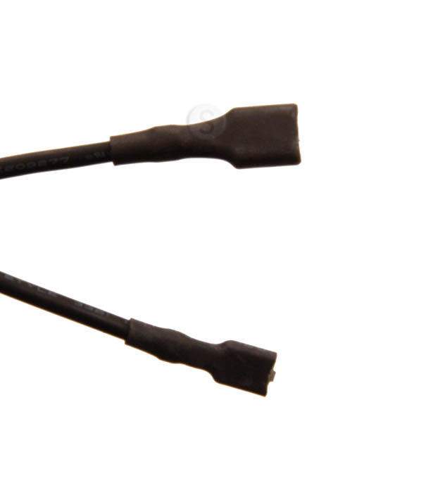 Pair of black wiring connectors with molded ends