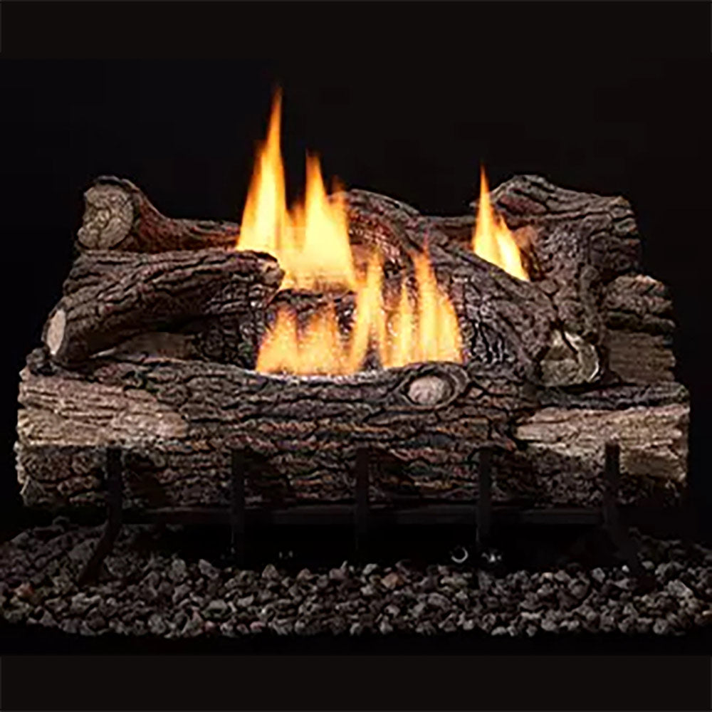 Faux log set with three burning flames and charred wood texture
