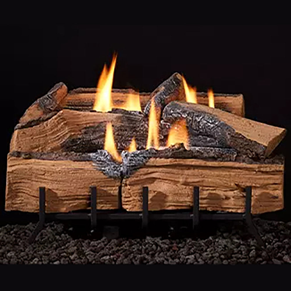 Outdoor split log set with burning split logs and black metal grate