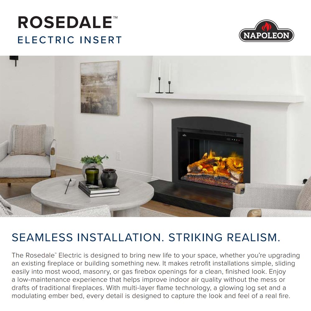 Black electric fireplace insert in a wall niche with lit flame display