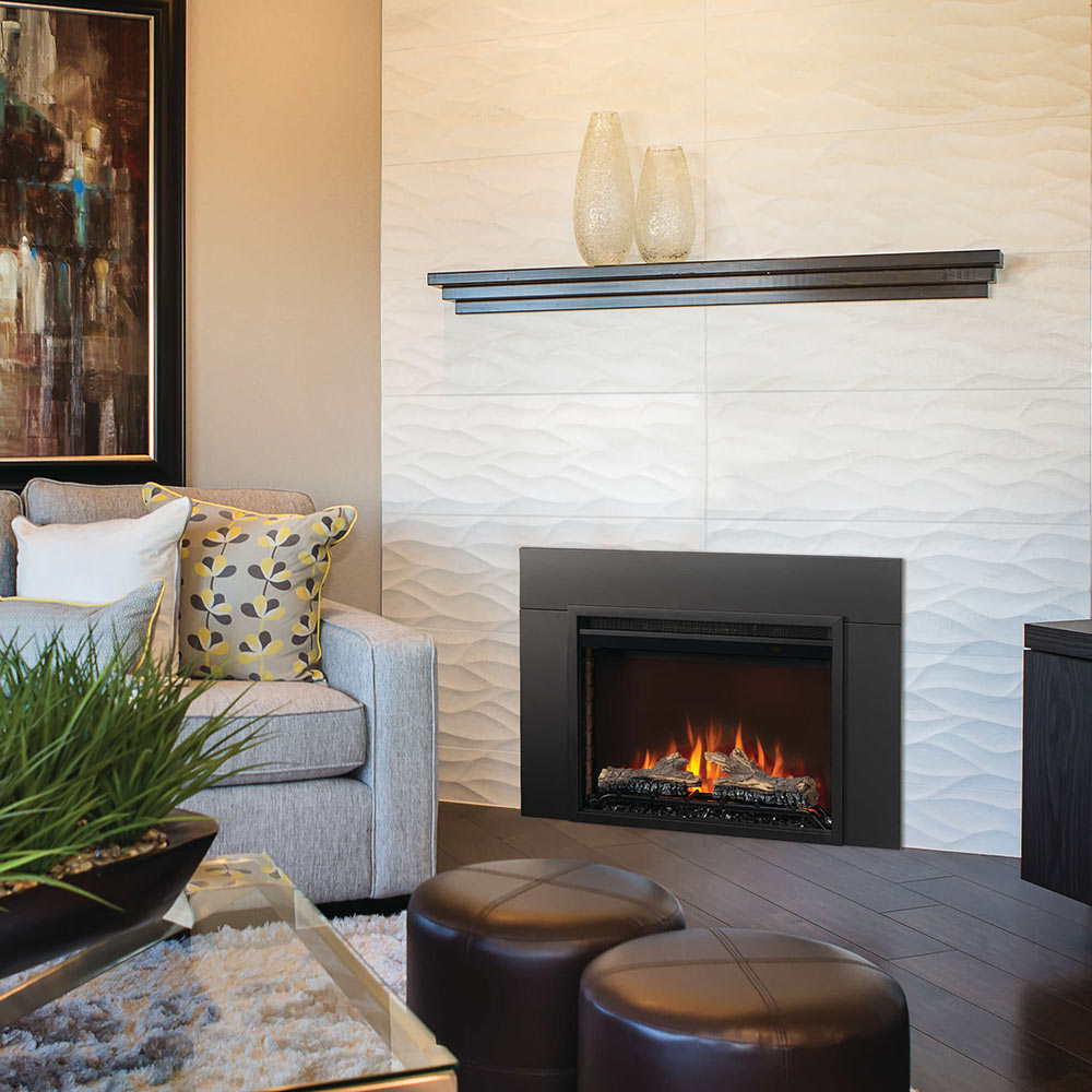 Black electric fireplace insert set into a wall with visible flames